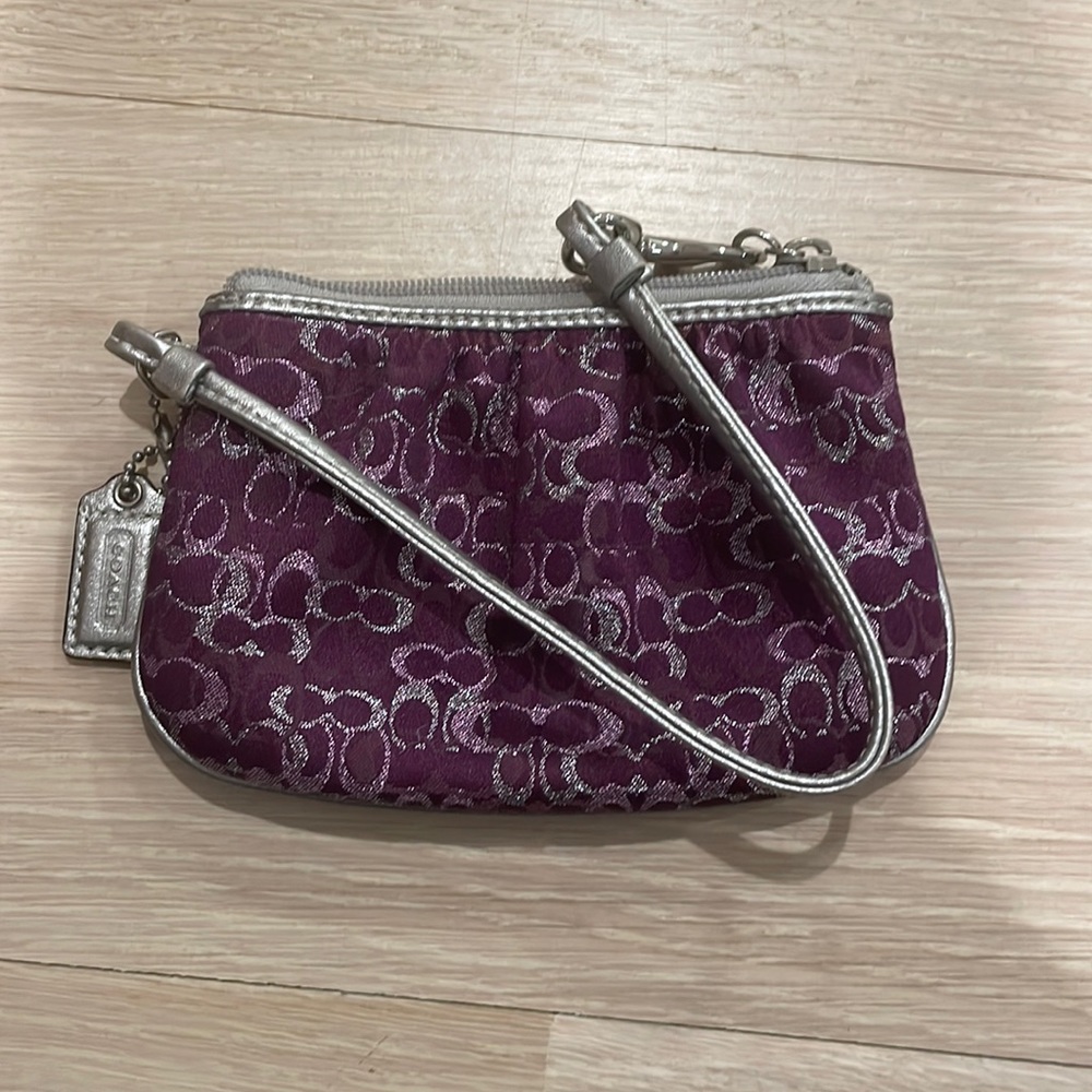 Purple and silver coach wristlet